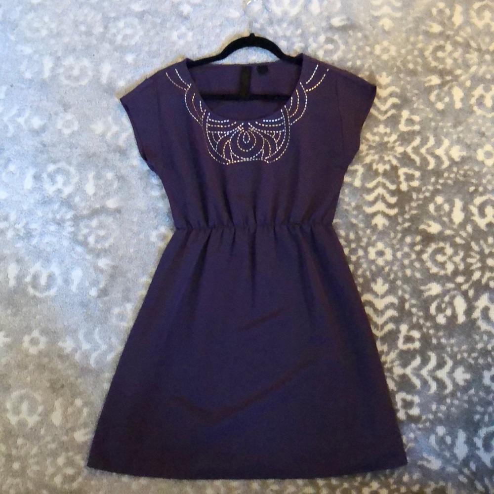 Purple medal-studded dress
